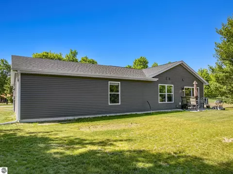 Exterior - 18880 Lance Ln, Interlochen, MI 49643 photo 6 of 14