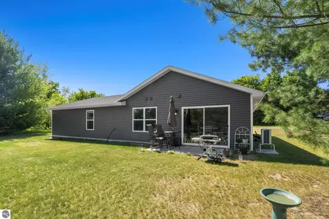 Exterior - 18880 Lance Ln, Interlochen, MI 49643 photo 7 of 14