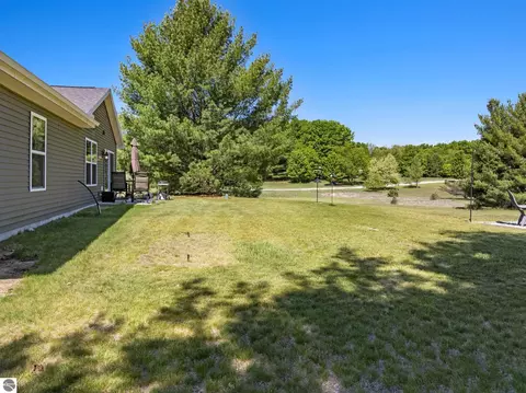 Exterior - 18880 Lance Ln, Interlochen, MI 49643 photo 11 of 14