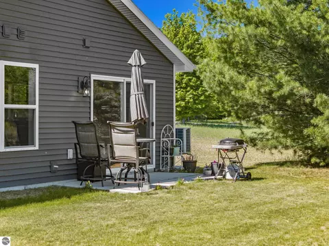 Exterior - 18880 Lance Ln, Interlochen, MI 49643 photo 2 of 14