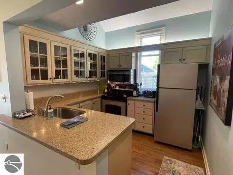 Kitchen - 2 Pinnacle Pl # C, Glen Arbor, MI 49636 photo 1 of 2