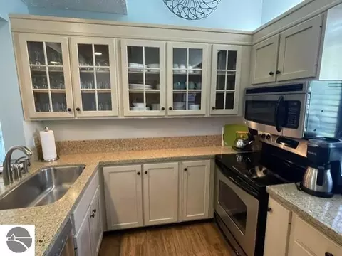 Kitchen - 2 Pinnacle Pl # C, Glen Arbor, MI 49636 photo 2 of 2