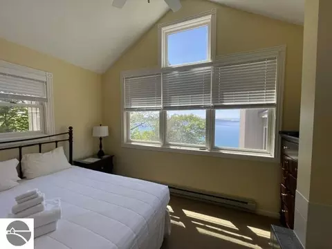 Bedroom - 2 Pinnacle Pl # C, Glen Arbor, MI 49636 photo 2 of 5