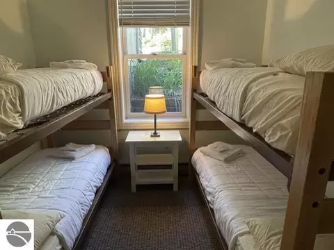 Bedroom - 2 Pinnacle Pl # C, Glen Arbor, MI 49636 photo 3 of 5