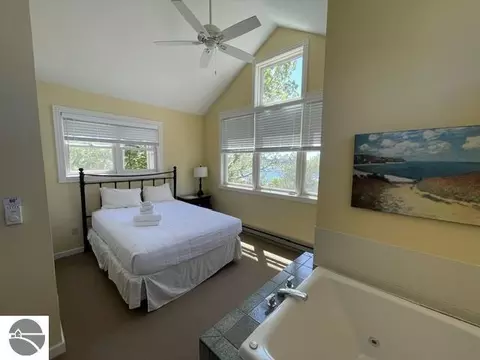 Bedroom - 2 Pinnacle Pl # C, Glen Arbor, MI 49636 photo 1 of 5