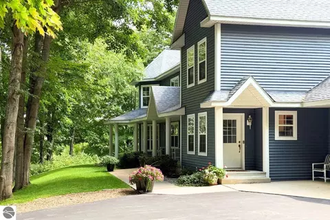 Exterior - 8401 S Sullivan Rd, Cedar, MI 49621 photo 3 of 17