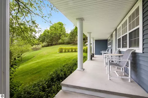 Exterior - 8401 S Sullivan Rd, Cedar, MI 49621 photo 6 of 17