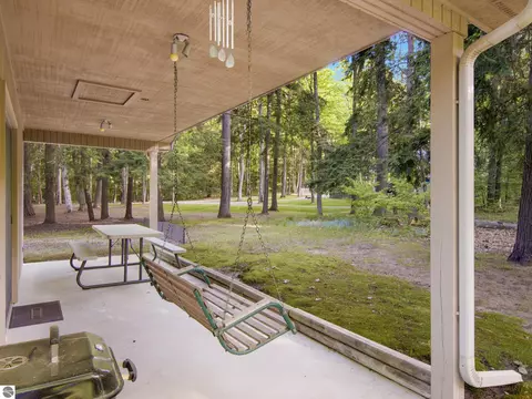 Exterior - 8646 Deadstream Rd, Honor, MI 49640 photo 7 of 18