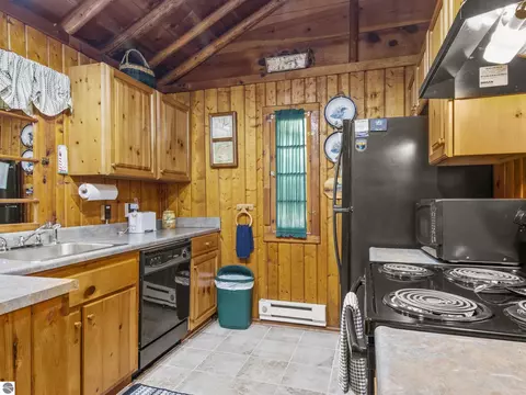 Kitchen - 8646 Deadstream Rd, Honor, MI 49640 photo 2 of 6