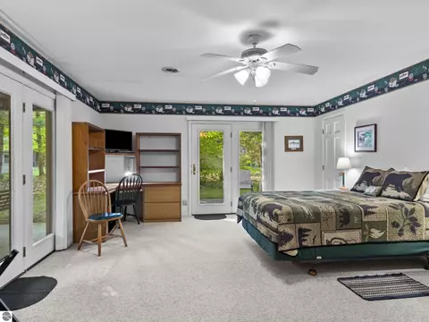 Bedroom - 8646 Deadstream Rd, Honor, MI 49640 photo 2 of 10
