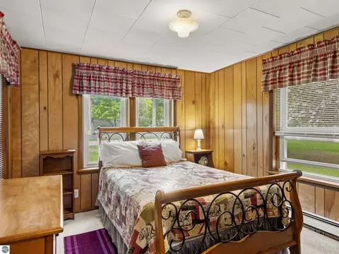 Bedroom - 8646 Deadstream Rd, Honor, MI 49640 photo 5 of 10