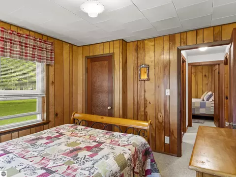 Bedroom - 8646 Deadstream Rd, Honor, MI 49640 photo 6 of 10
