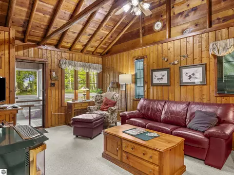 Living - 8646 Deadstream Rd, Honor, MI 49640 photo 3 of 7