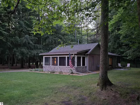 Exterior - 8646 Deadstream Rd, Honor, MI 49640 photo 2 of 18