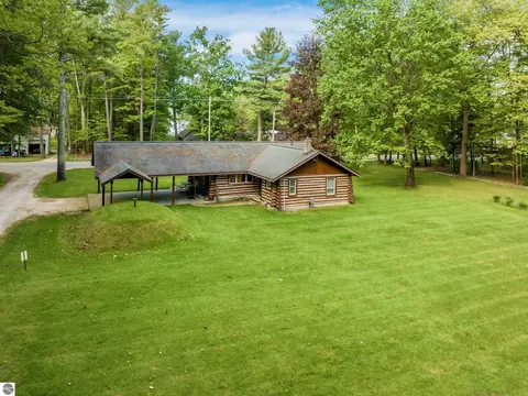 Exterior - 8646 Deadstream Rd, Honor, MI 49640 photo 9 of 18
