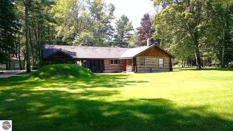 Exterior - 8646 Deadstream Rd, Honor, MI 49640 photo 1 of 18