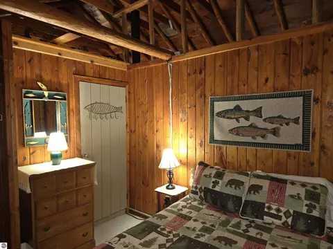 Bedroom - 8646 Deadstream Rd, Honor, MI 49640 photo 4 of 10