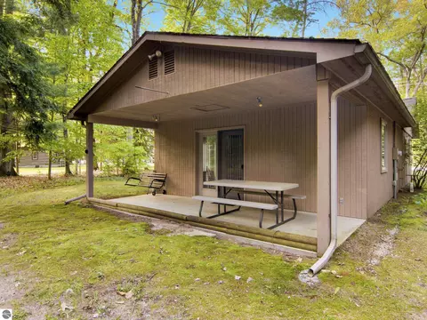 Exterior - 8646 Deadstream Rd, Honor, MI 49640 photo 6 of 18