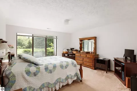 Bedroom - 11255 E Fort Rd #E-2, Suttons Bay, MI 49682 photo 1 of 5