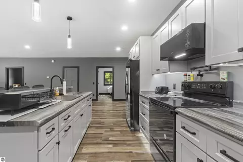 Kitchen - 4459 Ely Rd, Honor, MI 49640 photo 1 of 3