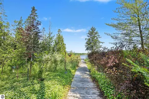 Exterior - 9948 Harmony Dr, Interlochen, MI 49643 photo 5 of 16