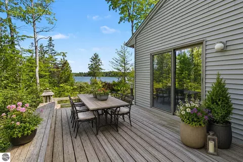 Exterior - 9948 Harmony Dr, Interlochen, MI 49643 photo 3 of 16