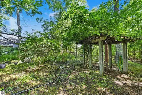 Exterior - 9948 Harmony Dr, Interlochen, MI 49643 photo 16 of 16