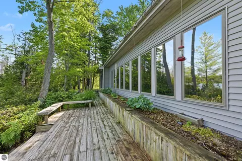 Exterior - 9948 Harmony Dr, Interlochen, MI 49643 photo 4 of 16