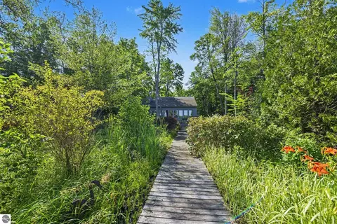 Exterior - 9948 Harmony Dr, Interlochen, MI 49643 photo 11 of 16