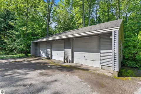 Exterior - 9948 Harmony Dr, Interlochen, MI 49643 photo 9 of 16