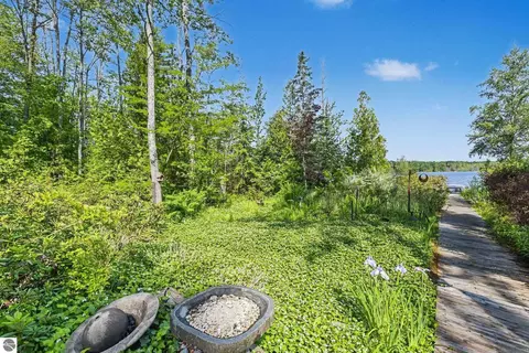 Exterior - 9948 Harmony Dr, Interlochen, MI 49643 photo 6 of 16