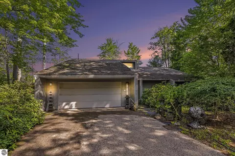 Exterior - 9948 Harmony Dr, Interlochen, MI 49643 photo 2 of 16