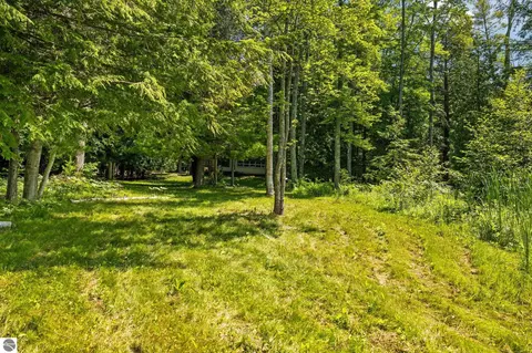 Exterior - 10000 Harmony Dr, Interlochen, MI 49643 photo 2 of 18