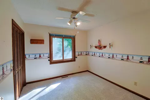 Bedroom - 8800 Golfside Ct, Shepherd, MI 48883 photo 2 of 6