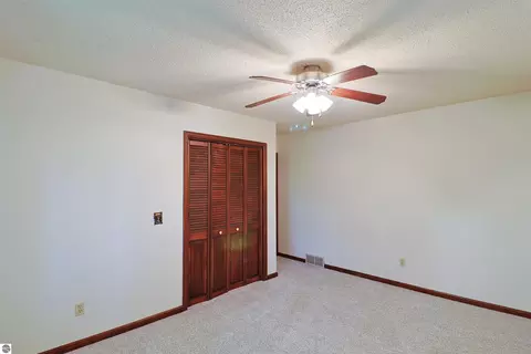Bedroom - 8800 Golfside Ct, Shepherd, MI 48883 photo 3 of 6