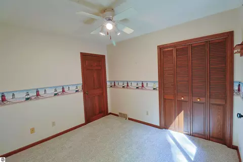 Bedroom - 8800 Golfside Ct, Shepherd, MI 48883 photo 1 of 6