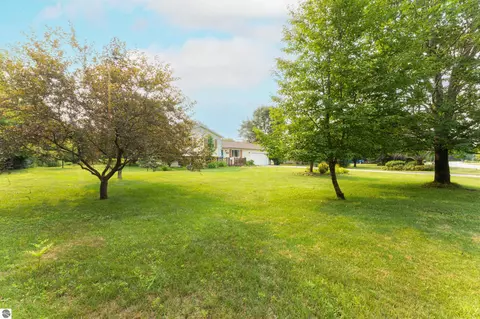 Exterior - 2667 Pine Breeze Dr, Interlochen, MI 49643 photo 9 of 12