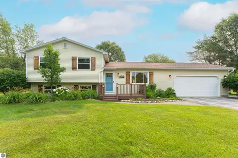 Exterior - 2667 Pine Breeze Dr, Interlochen, MI 49643 photo 1 of 12