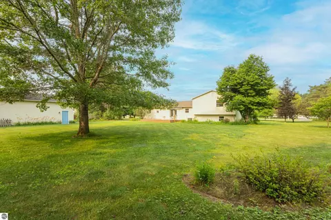Exterior - 2667 Pine Breeze Dr, Interlochen, MI 49643 photo 12 of 12