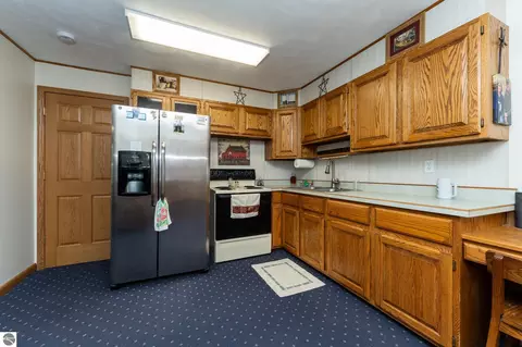 Kitchen - 2539 E And 2765 E Rock Rd, Clare, MI 48617 photo 2 of 5