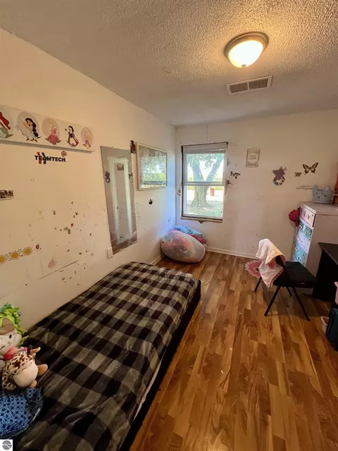 Bedroom - 9026 E Harrison Rd, Wheeler, MI 48662 photo 2 of 3
