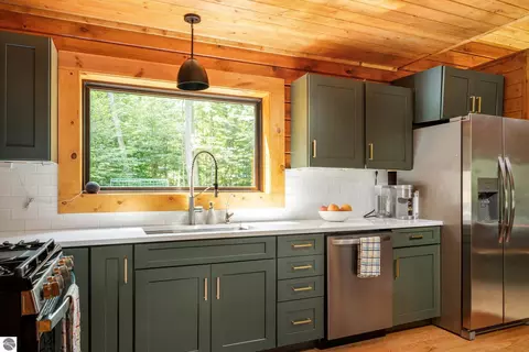 Kitchen - 2470 E Cherry Ln, Cedar, MI 49621 photo 7 of 9