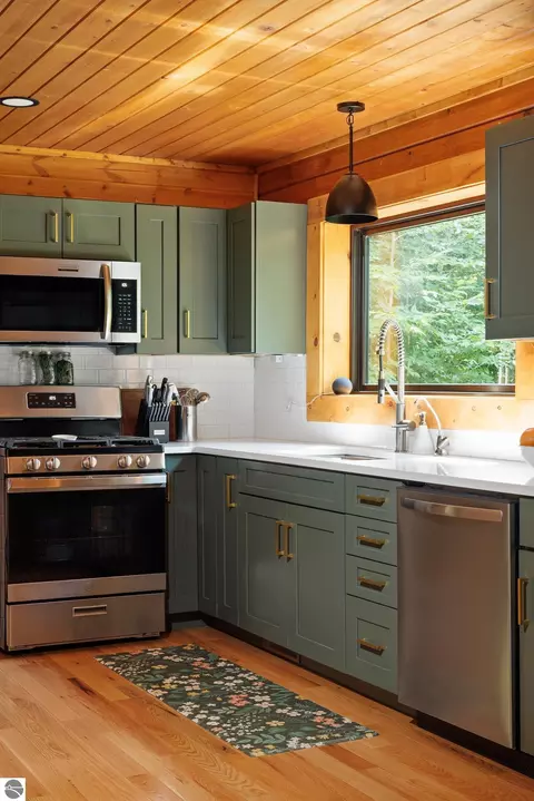 Kitchen - 2470 E Cherry Ln, Cedar, MI 49621 photo 6 of 9