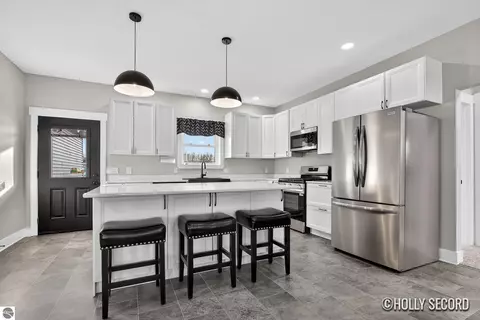 2857 Peregrine Dr, Elmira, MI 49730