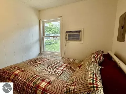 Bedroom - 4162 Chrystal St, Interlochen, MI 49643 photo 4 of 4