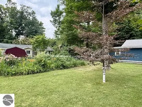 Exterior - 4162 Chrystal St, Interlochen, MI 49643 photo 9 of 22
