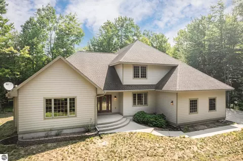 Exterior - 3672 Dock Rd, Williamsburg, MI 49690 photo 2 of 9