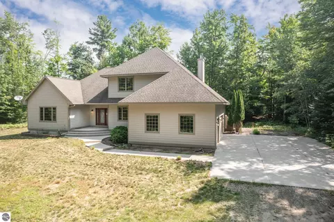 Exterior - 3672 Dock Rd, Williamsburg, MI 49690 photo 4 of 9