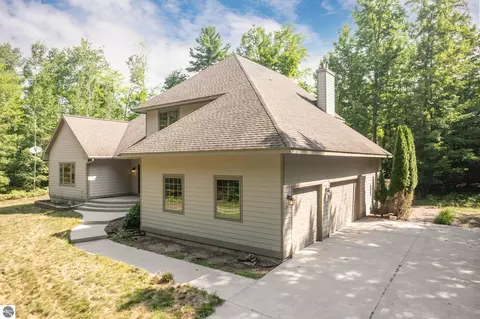 Exterior - 3672 Dock Rd, Williamsburg, MI 49690 photo 5 of 9