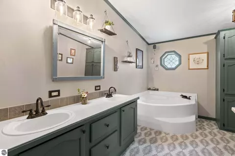Bath - 3652 S Schomberg Rd, Cedar, MI 49621 photo 1 of 7